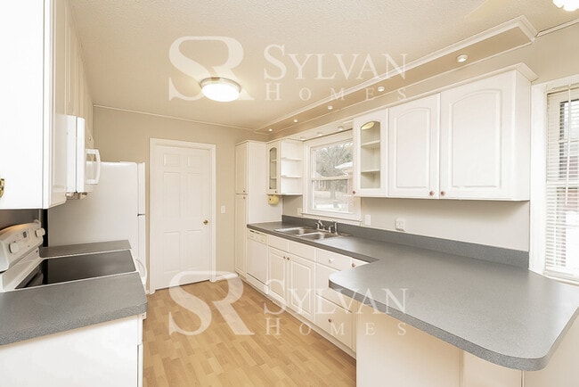 Building Photo - Turn the key. Enter. Smile. Repeat every day!