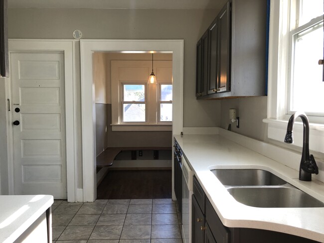 Kitchen with view of dining nook and rear enterance - 1623 Lafayette Blvd