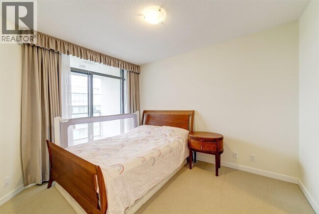 Photo du bâtiment - 6888 Alderbridge Wy