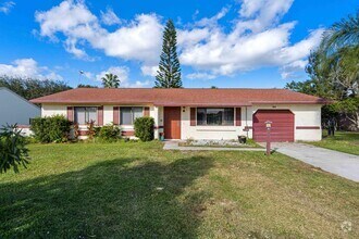 Building Photo - 1433 SE North Balcourt Ct