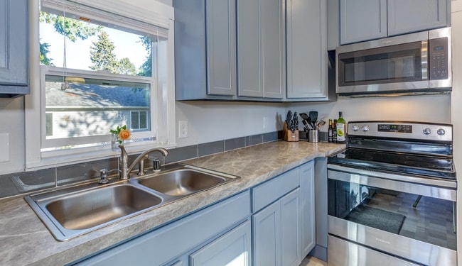 Building Photo - Fully Remodeled Home with Bonus Suite – A ...