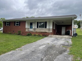 Beautiful newly updated home with new flooring, paint, windows, and light fixtures in quiet area. - 512 Madison Ave