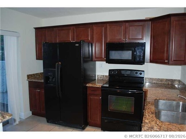 Building Photo - 6557 NW 99th Ave