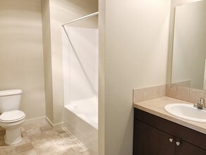 Quartz Dark Bathroom - Stoneplace Apartment Homes