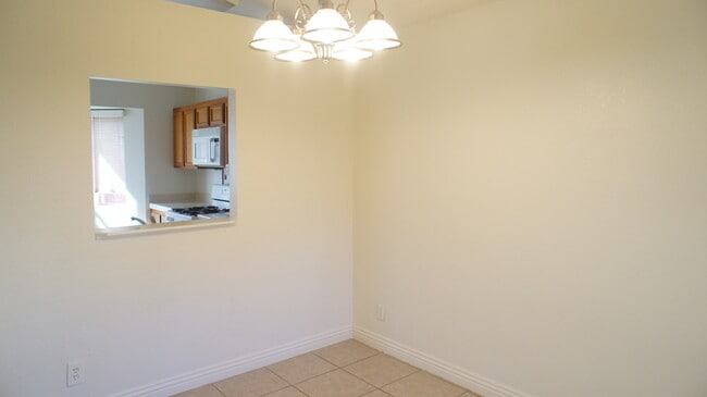 Building Photo - Single-Story Home with Fireplace, Community Pool & Covered Patio