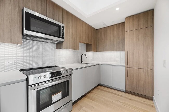 Building Photo - 27-10 37th Ave