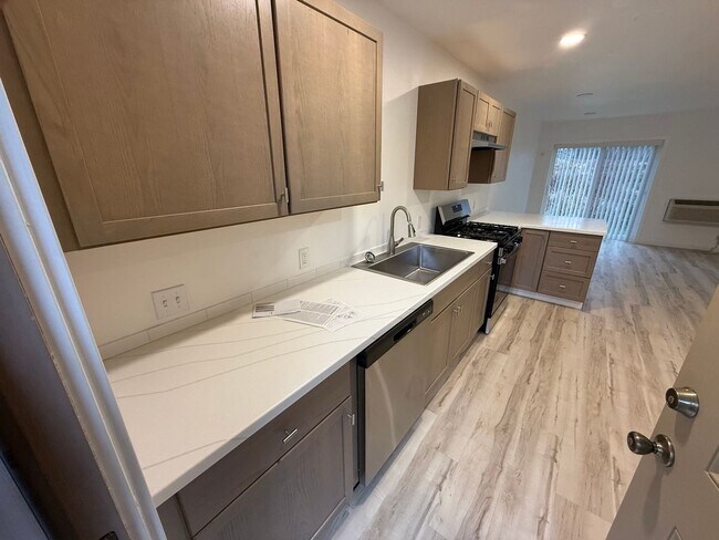 Building Photo - Newly Remodeled | All Utilities Included | AC + Heat | Move-In Ready
