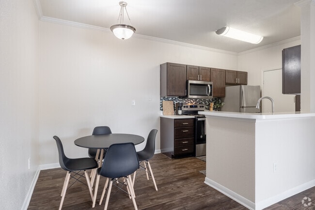 3BR, 2BA - 1,115SF - Kitchen/Dining Area - River Oaks Villas Apartments