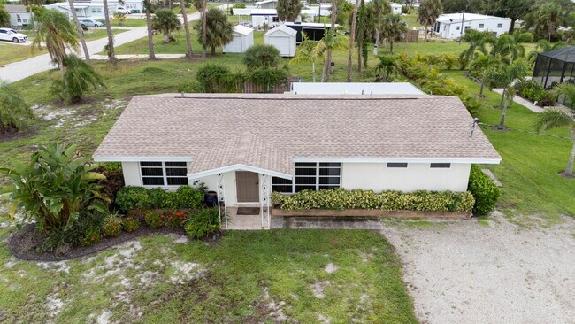 Building Photo - 3-bedroom home offers approximately 1,144 square feet of living space, an attached garage, an ove...