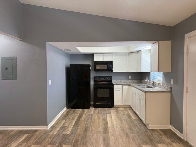 Building Photo - 65th Terrace N - Triplex