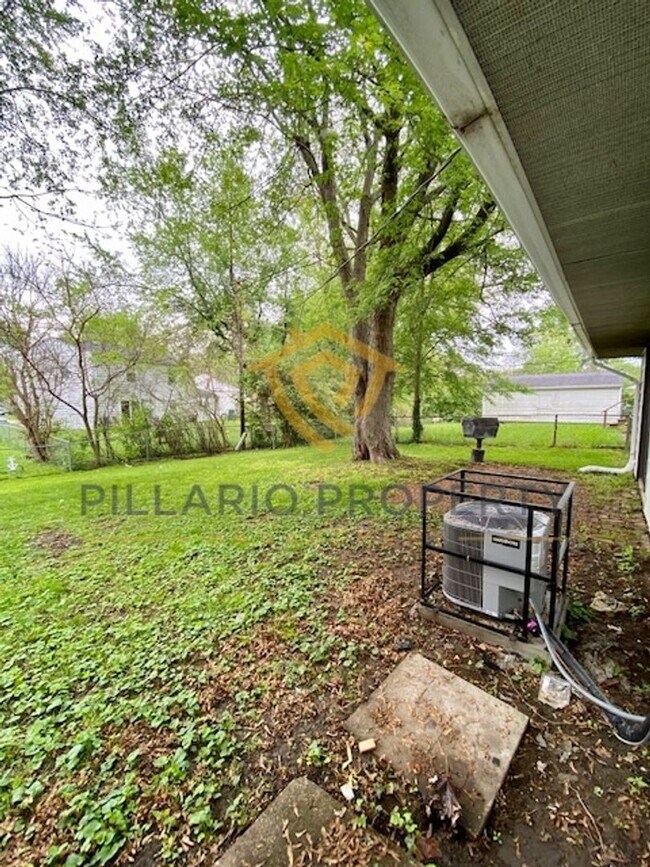 Building Photo - East Side, 3 Bedroom/1.5 Bathroom Beauty A...