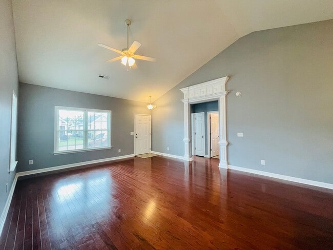 Photo - Rare offering in Palmetto Cove! POND FRONT... House