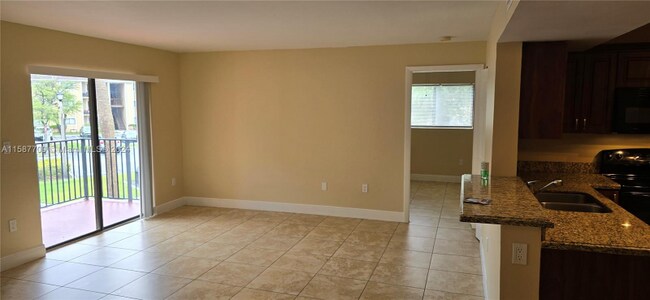 Building Photo - 9491 Palm Cir S