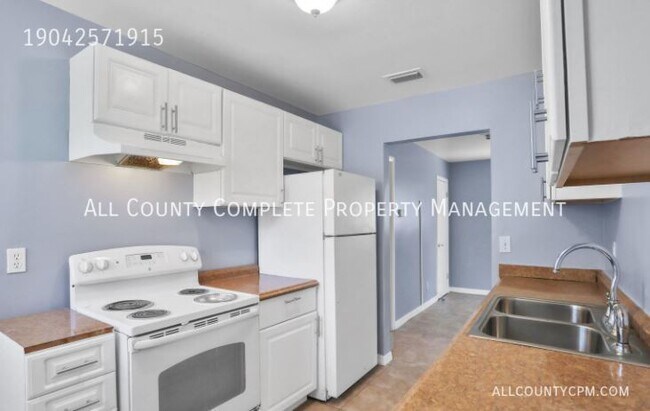 Building Photo - 6767 Tinkerbell Ln