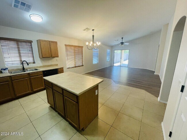 Building Photo - 36393 W El Greco St