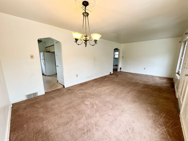 Building Photo - Beautiful Three Bedroom with Basement and Garage