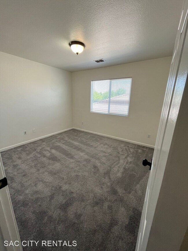 Building Photo - 4 br, 2.5 bath House - 10040 Wild Orchid Way