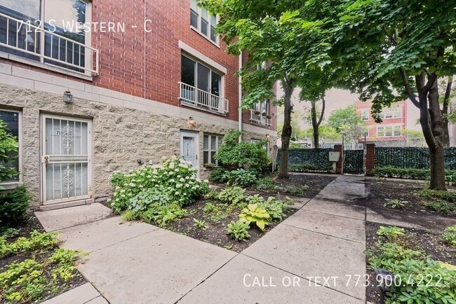 Building Photo - 712 S Western-C