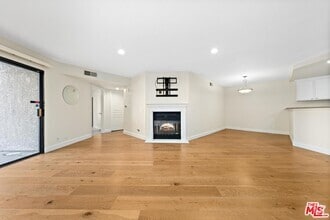Building Photo - 1633 S Bentley Ave