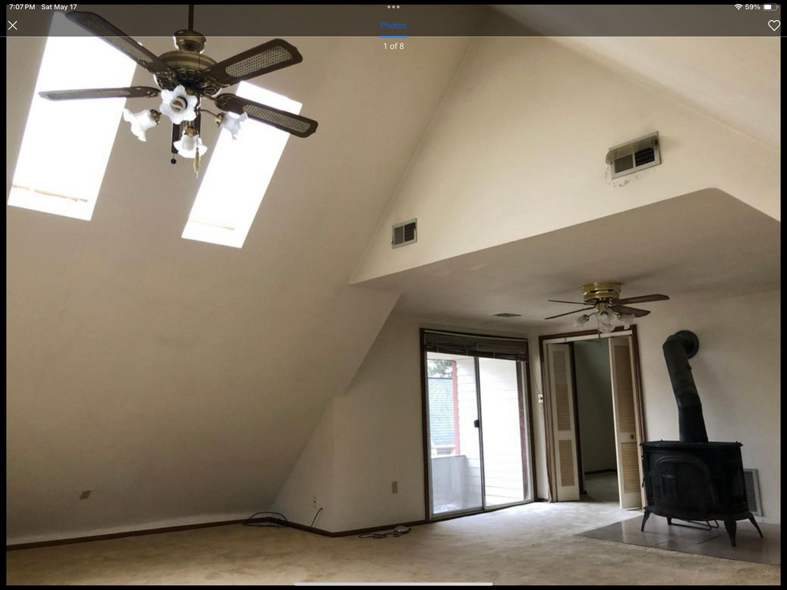 Living room cathedral ceiling with skylight - 1918 E 123rd St