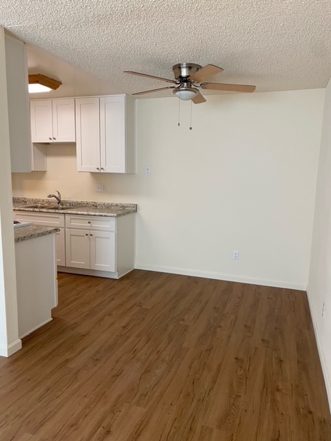 Separate dinning room with a ceiling fan - Lake Murray Villa