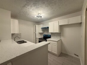 Building Photo - 8553 Wilcrest Dr