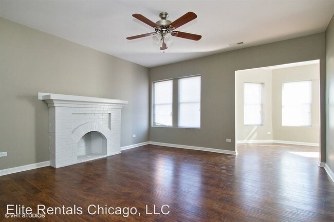 Building Photo - 4 br, 1 bath Apartment - 7542 S. Colfax Ave.