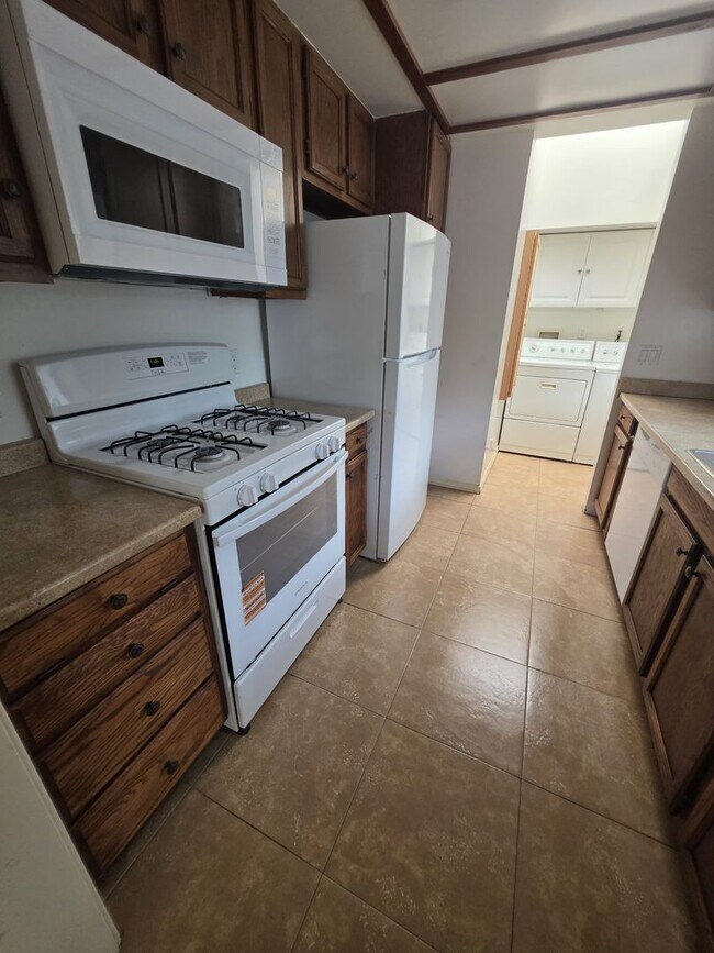 Building Photo - 5032-5036 Denny Ave