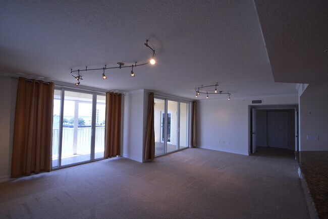 Building Photo - BEAUTIFUL RIVERFRONT 3/3 CONDO IN MERRITT ...