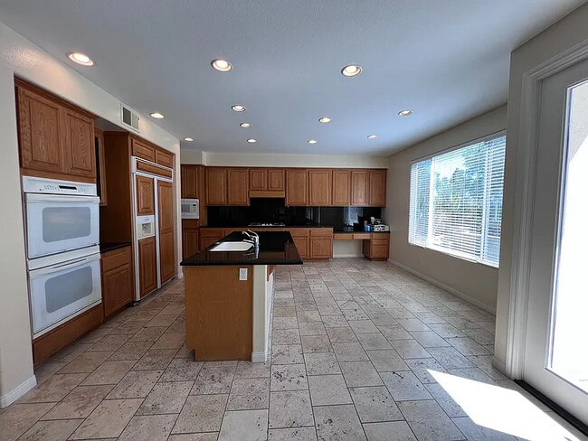 Building Photo - 6578 Petunia Pl