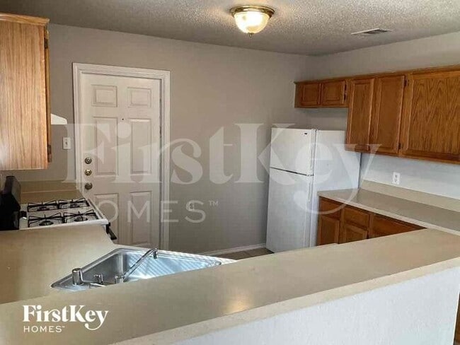 Building Photo - 10256 Budtime Ln