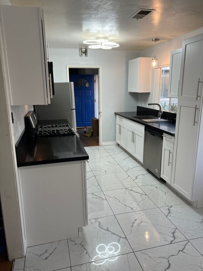 Building Photo - Huge 2 story 8 bed room Home: a hop and a ...