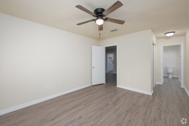 2BR, 1BA - 1,000SF - Primary Bedroom - Royal Springs Apartments