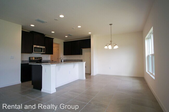 Foto del edificio - 5 br, 2.5 bath House - 1677 Swan Swim Dr