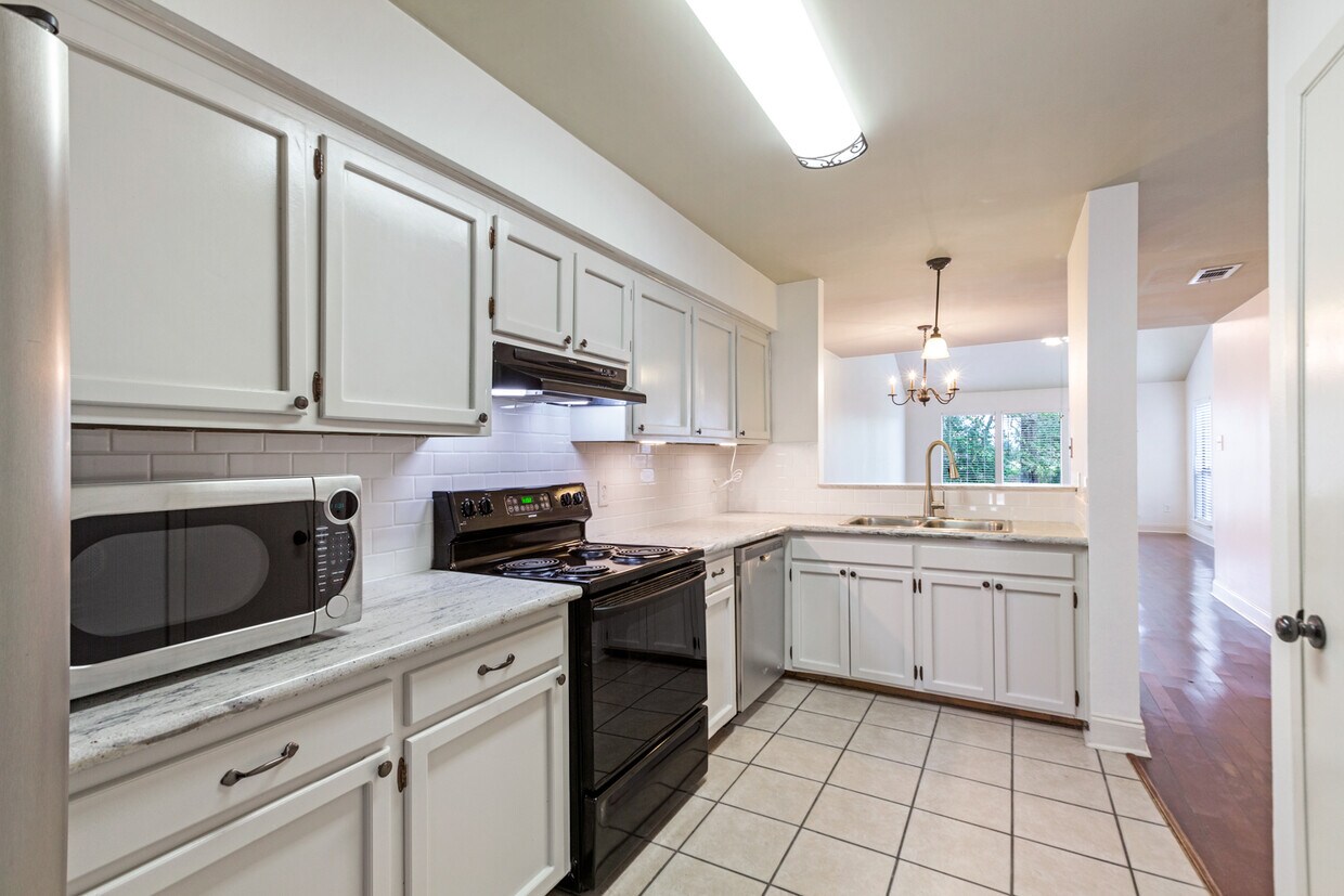 Renovated Kitchen with Granite Counters and Subway Backsplash - 10333 Jefferson Hwy