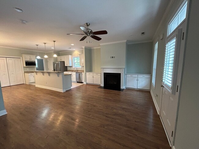 Building Photo - Enjoy private living in this beautiful 3 bedroom, 2.5 bathroom home on almost half acre lot!