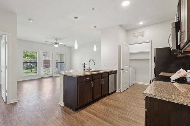 Enjoy seamless open-concept living with a bright kitchen and airy layout at Allora Bella Terra - Allora Bella Terra