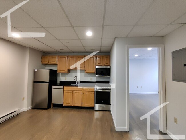 Building Photo - Avl NOW - Fully renovated garden level/ground floor 2BR