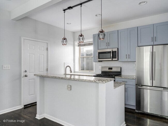 Foto del edificio - 5134 N Oakley Ave