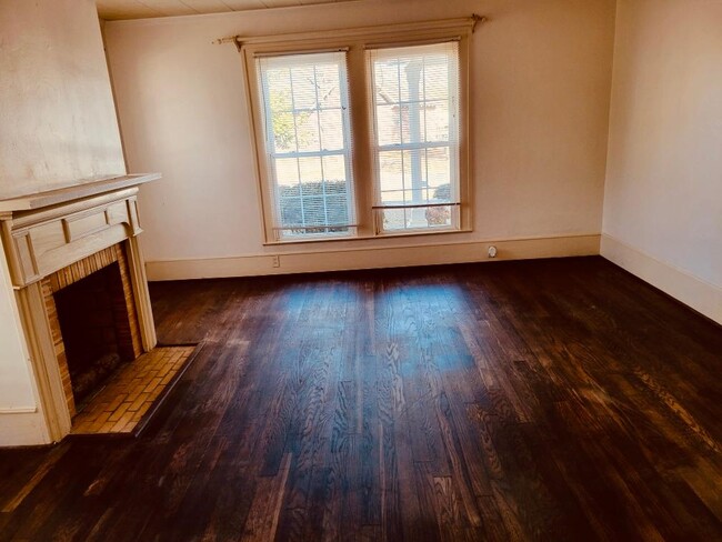 Family Room with a functional fire place - 109 S Outerbridge St