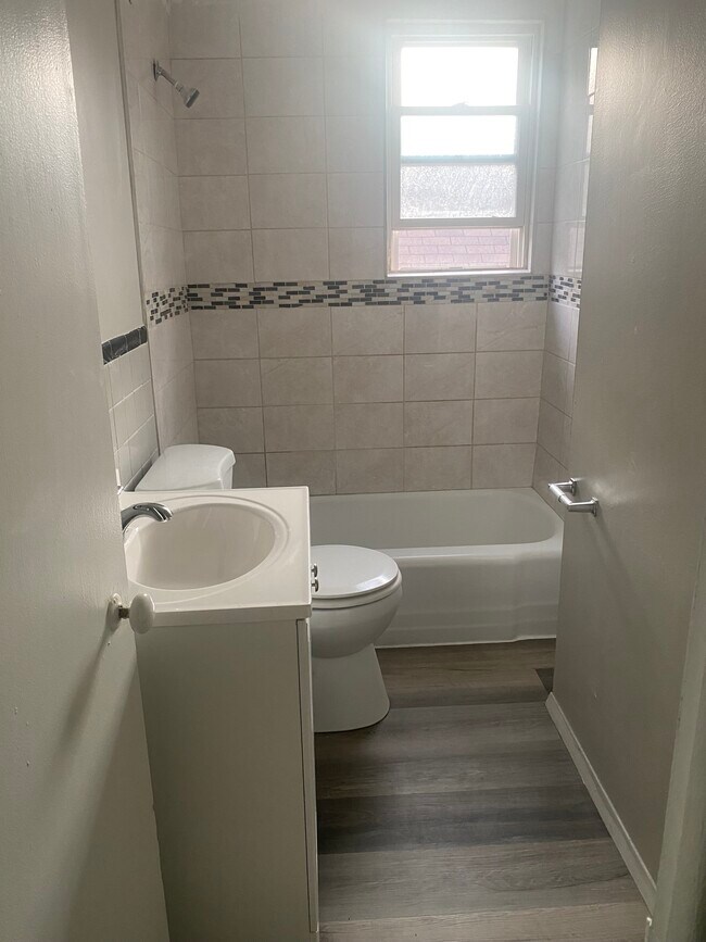 Enjoy your showers in this cleaned bathroom! - 24 Irving St
