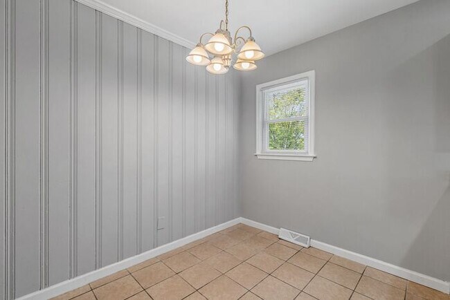 Building Photo - Updated Home with Hardwood Floors, LR & De...