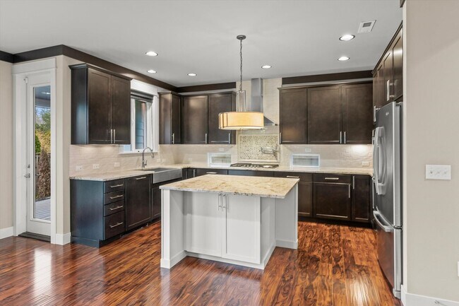 Building Photo - Backyard Putting Green + Outdoor Fireplace | Comfortable Puyallup Rental