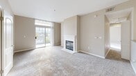 Located at 755 E Capitol in Milpitas, CA, this single-floor, 3-bedroom, 1-bathroom home offers a well-designed layout with a thoughtful mix of comfort and functionality. The open-concept living and kitchen area serves as the heart of the home, where a cozy fireplace anchors the carpeted living room alongside a sliding glass door that opens to a private balcony with outdoor views. The kitchen is equipped with rich dark wood cabinetry, granite countertops, a peninsula with breakfast bar seating, and black appliances including a refrigerator, range, and microwave. Wood-look flooring runs throughout the kitchen, complementing the warm neutral tones found across the space. The three bedrooms are carpeted and filled with natural light from arched and standard windows offering scenic neighborhood views. The primary bedroom includes a ceiling fan, closet access, and direct entry to the hallway. Additional bedrooms provide ample space with large windows and neutral walls. The full bathroom features a granite-topped vanity with dark wood cabinetry, a tub-shower combination, and wood-look flooring. A hallway connects all rooms, creating a cohesive and efficient flow throughout this well-appointed Milpitas home.