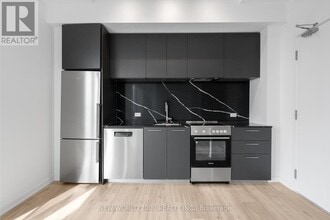 Building Photo - 101-3101 Roehampton Ave