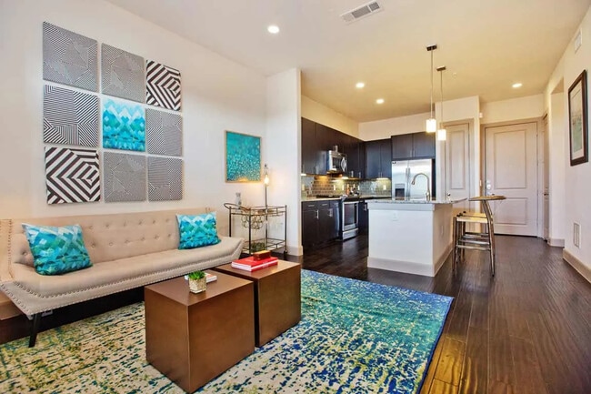 Building Photo - Making Midtown Buzz — Live in Style Today!