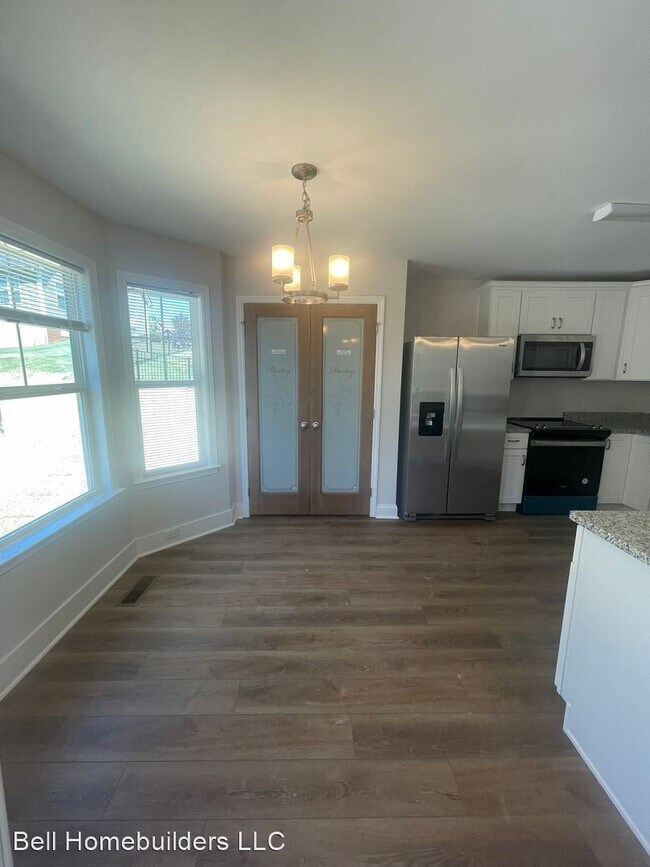 Building Photo - 3 br, 2.5 bath House - 7240 Old Bug Lane