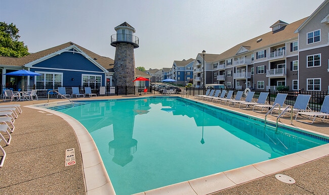 Outdoor Heated Pool With Sundeck - Waters Edge Apartments