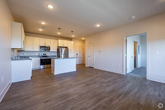 1BR, 1BA - RETREAT Kitchen/Living Room - EVO Townhomes & Apartments
