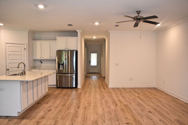 Building Photo - Almost New Four Bedroom in Marina Village